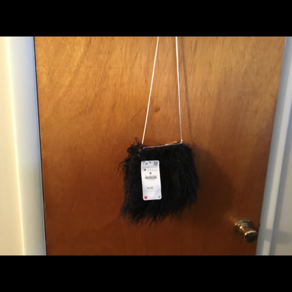 Zara black faux fur crossbody bag.